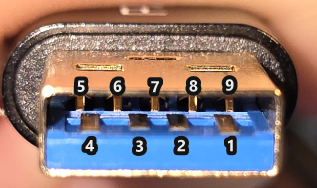 Photo: USB 3.0 cable end showing 9-pin connector interior